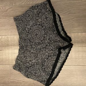 Flowy black floral shorts, medium with lace trim